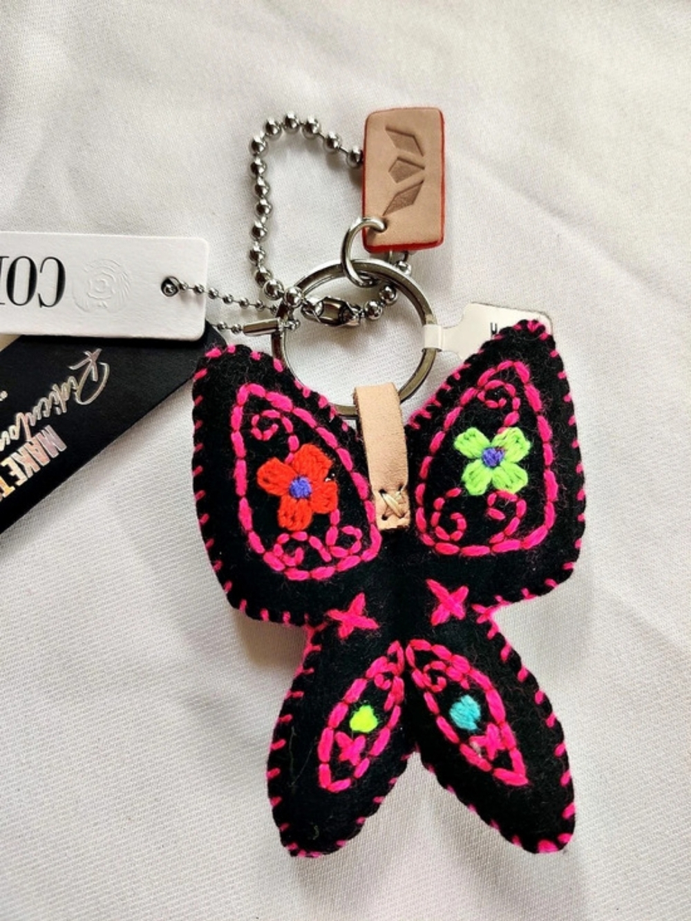 Consuela Black Felt Mariposa Charm Keychain Black & Pink